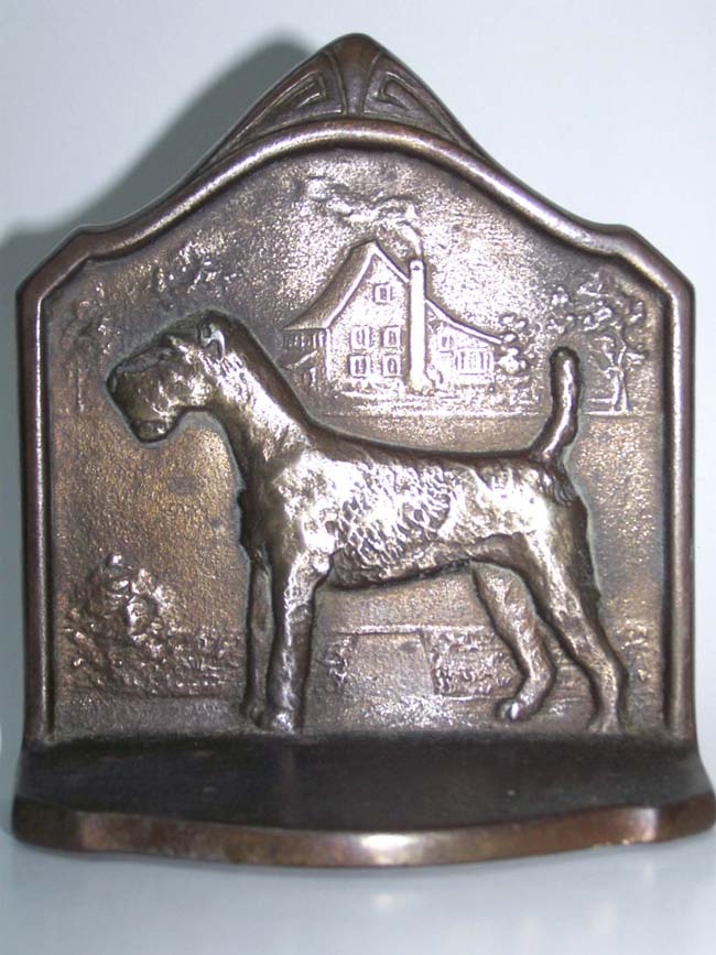 A pair of Antique Bookends by the Connecticut Foundry circa 1929 depicting a Wire Haired Terrier